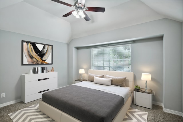 carpeted bedroom with lofted ceiling and ceiling fan