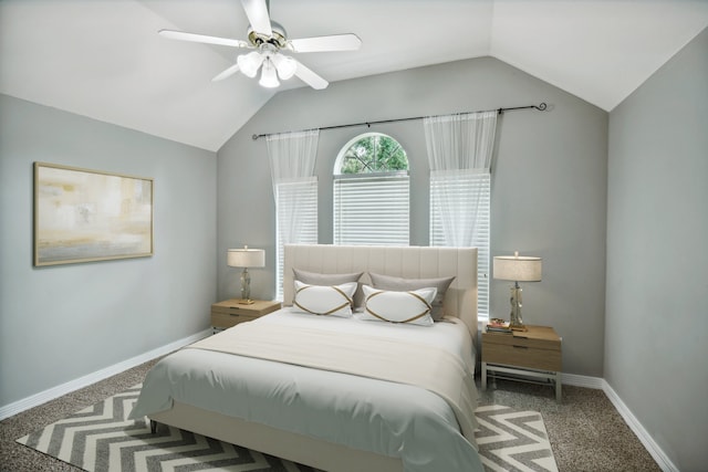 bedroom with carpet, ceiling fan, and vaulted ceiling