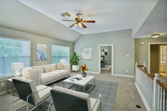 carpeted living room with vaulted ceiling and ceiling fan