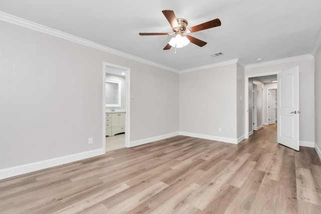 empty room with sink, crown molding, ceiling fan, and light hardwood / wood-style floors