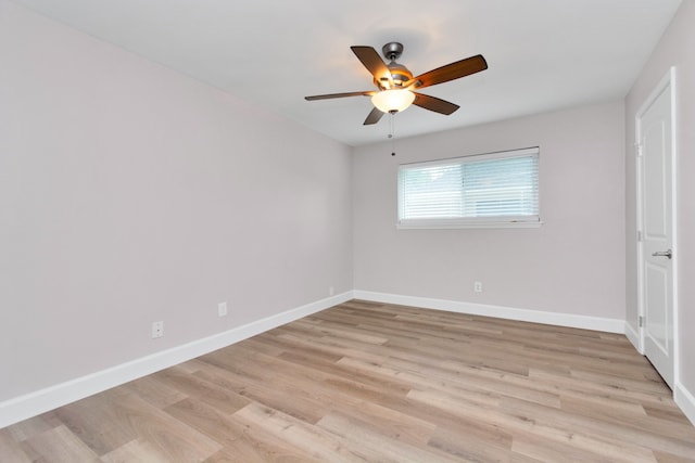 unfurnished room with light wood-type flooring and ceiling fan