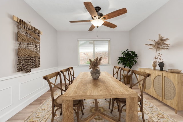 dining area featuring light wood-type flooring and ceiling fan