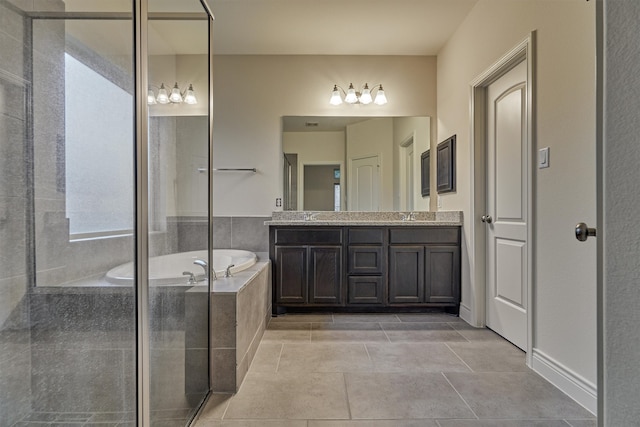 bathroom featuring independent shower and bath, tile patterned flooring, and double sink vanity