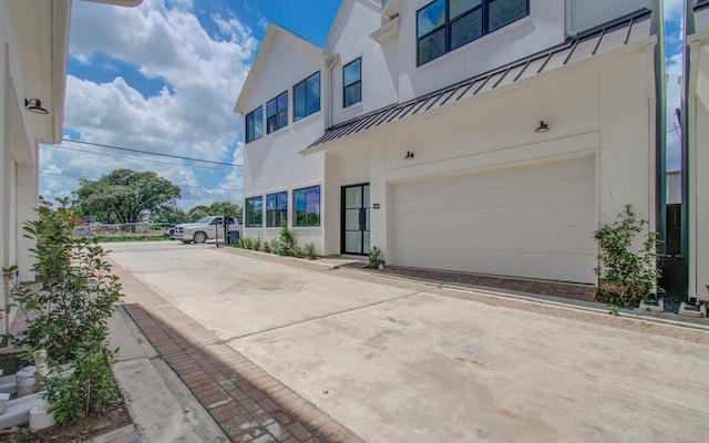 exterior space featuring a garage