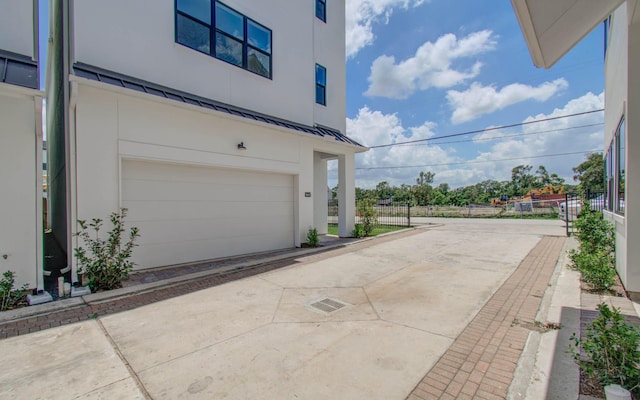 exterior space with a garage