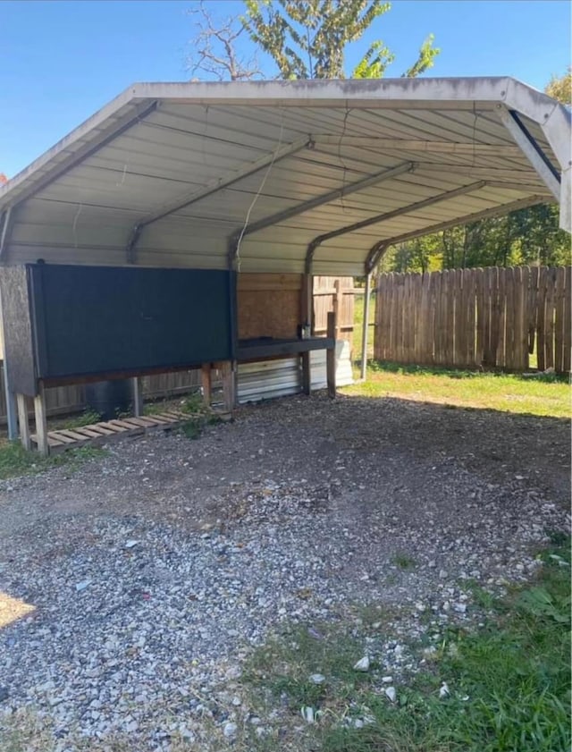 view of parking with a carport