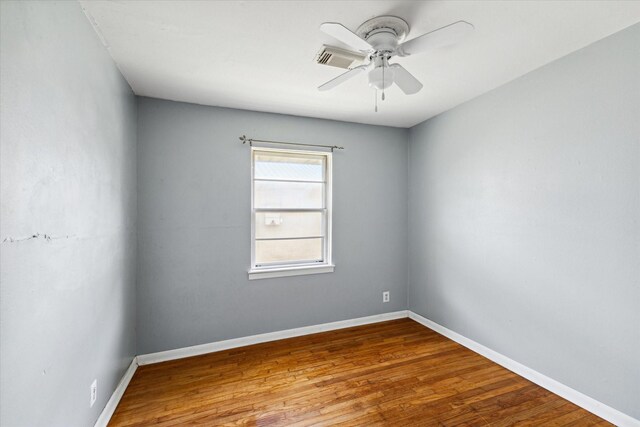 unfurnished room featuring wood-type flooring and ceiling fan