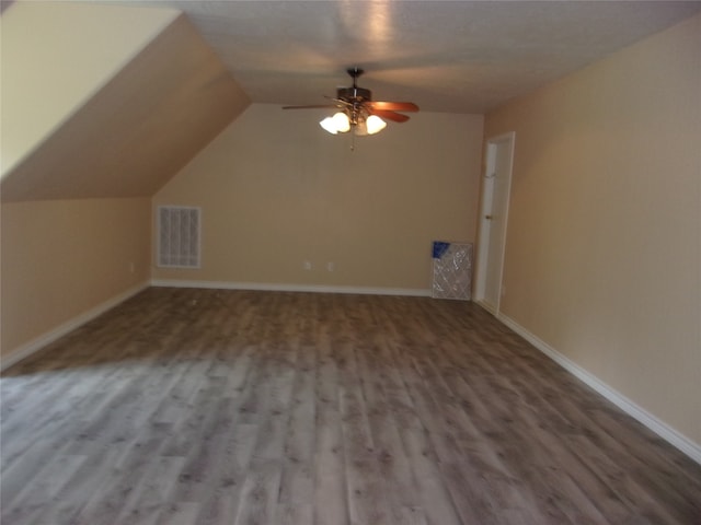 bonus room with vaulted ceiling, ceiling fan, and hardwood / wood-style floors