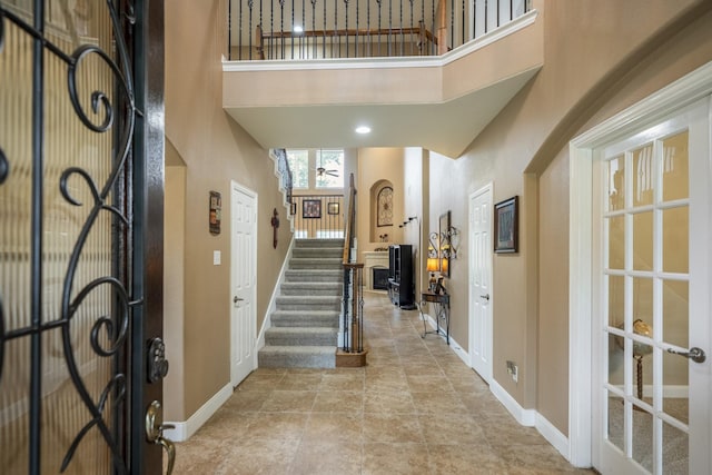 entrance foyer featuring a high ceiling