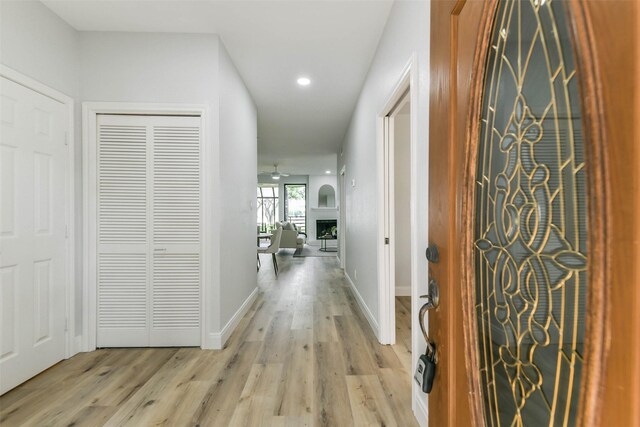 corridor featuring light hardwood / wood-style flooring