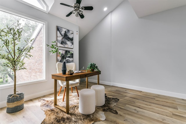 office featuring hardwood / wood-style flooring, vaulted ceiling, and ceiling fan