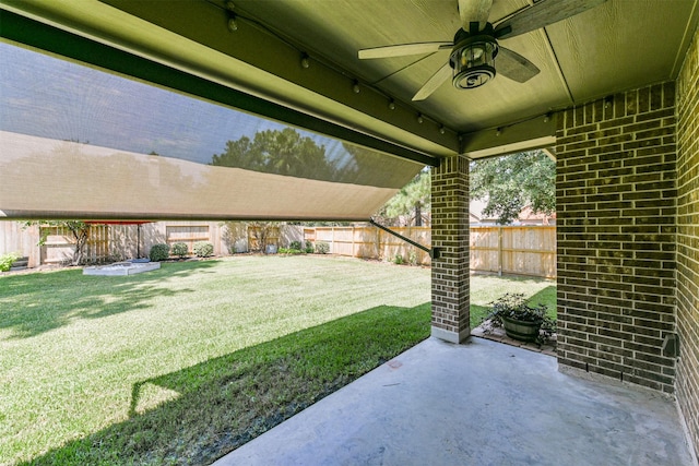 view of patio / terrace featuring ceiling fan