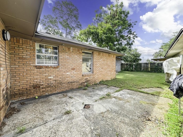 view of patio / terrace with fence