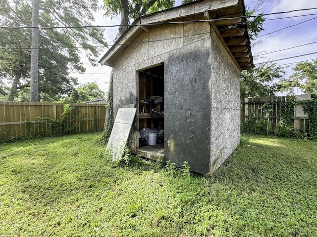 view of shed featuring a fenced backyard