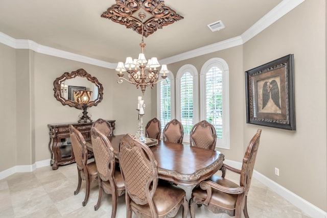 dining space with light tile patterned flooring, ornamental molding, and an inviting chandelier