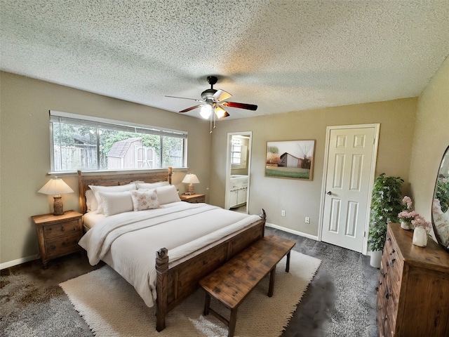 bedroom with ceiling fan and a textured ceiling