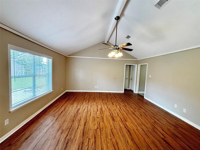 unfurnished room featuring vaulted ceiling with beams, hardwood / wood-style floors, and ceiling fan