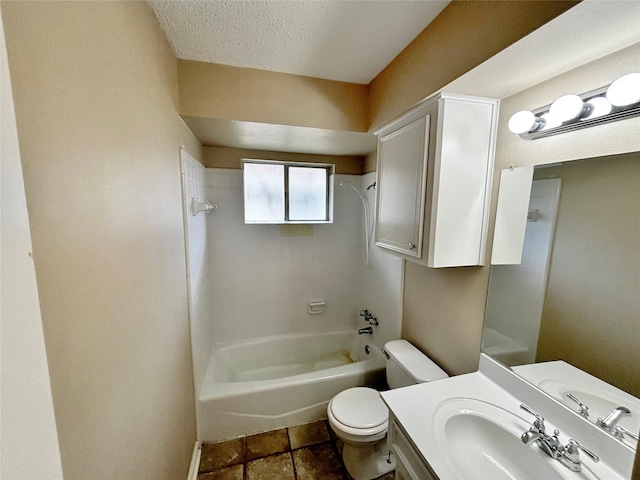 full bathroom featuring vanity, toilet, bathing tub / shower combination, and a textured ceiling