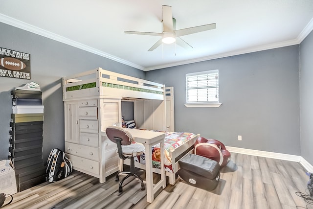 bedroom with light wood-type flooring, ceiling fan, and crown molding