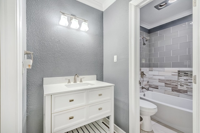 full bathroom featuring vanity, crown molding, toilet, tiled shower / bath, and tile patterned floors