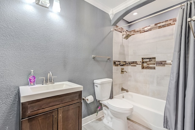 full bathroom featuring toilet, tile patterned flooring, crown molding, vanity, and shower / bath combo