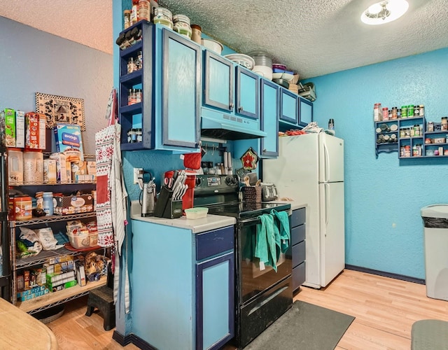 kitchen featuring black range with electric cooktop, light hardwood / wood-style flooring, blue cabinetry, and a textured ceiling