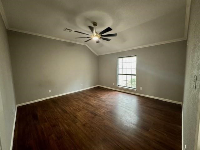 spare room featuring dark hardwood / wood-style floors, crown molding, and ceiling fan