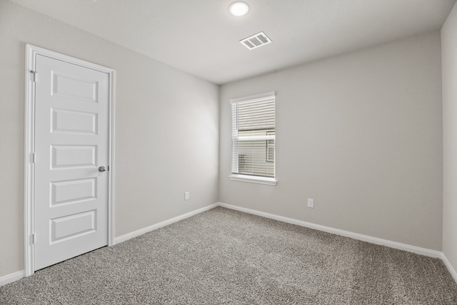 spare room with carpet floors