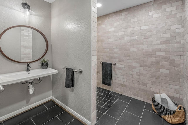 798 Lcr 703, Kosse, TX 76653 - bathroom with tile patterned floors and a textured wall
