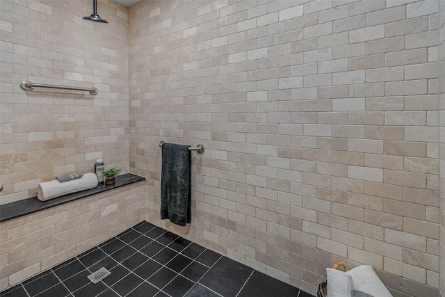 798 Lcr 703, Kosse, TX 76653 - bathroom featuring tile patterned flooring and tile walls