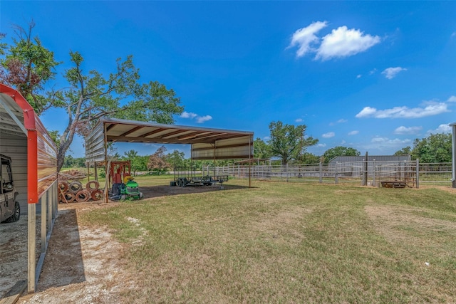 798 Lcr 703, Kosse, TX 76653 - view of yard featuring a carport, an outbuilding, and an exterior structure