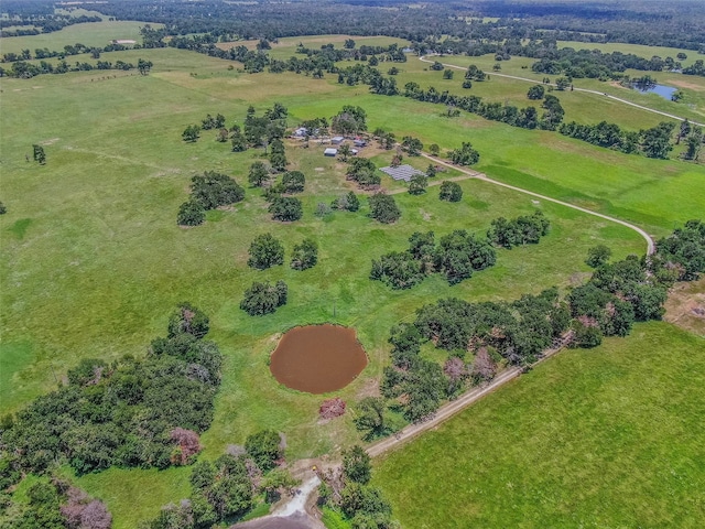 birds eye view of property featuring a rural view