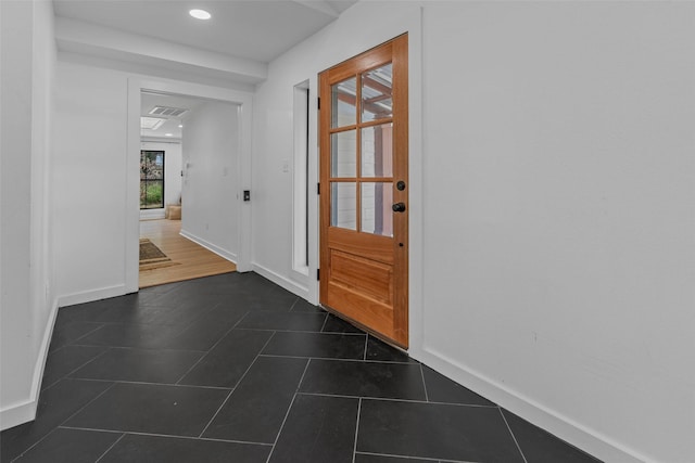 798 Lcr 703, Kosse, TX 76653 - entryway featuring recessed lighting and dark tile patterned floors