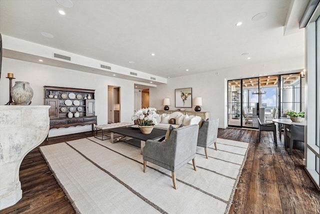 living room featuring dark hardwood / wood-style floors