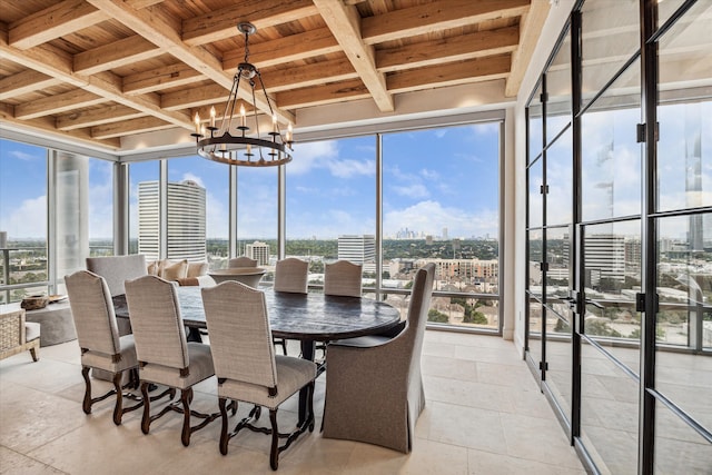 sunroom with a chandelier, wooden ceiling, and a healthy amount of sunlight