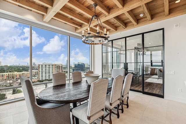 interior space featuring expansive windows, beamed ceiling, wood ceiling, light tile patterned floors, and an inviting chandelier