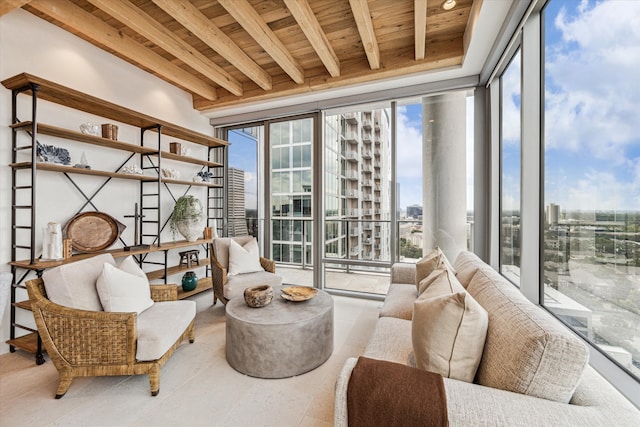 sunroom featuring wood ceiling and beamed ceiling