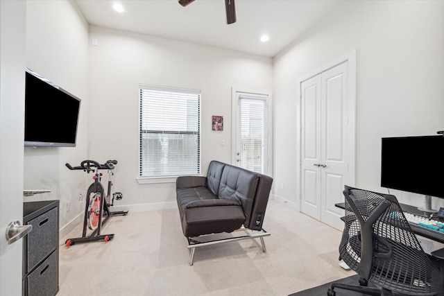 office featuring carpet and ceiling fan