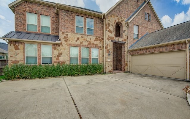 view of front of property featuring a garage