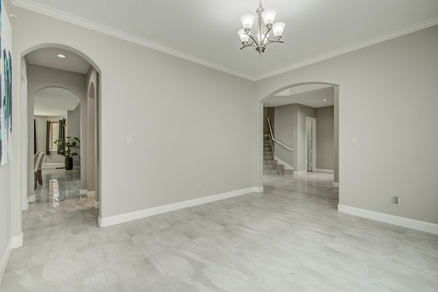 tiled empty room with crown molding and a chandelier