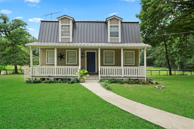 view of front of home featuring a porch and a front lawn