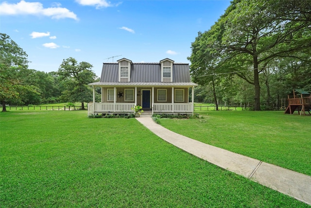 view of front of house featuring a front lawn and covered porch