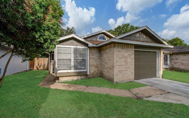 ranch-style house with a garage and a front lawn