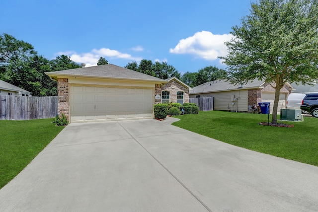 ranch-style house with central air condition unit, a front lawn, and a garage