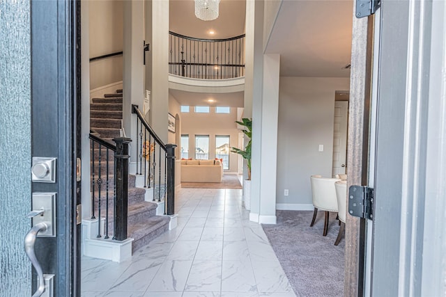 entrance foyer with a towering ceiling