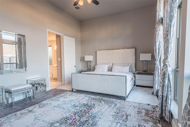 bedroom featuring ceiling fan and light colored carpet