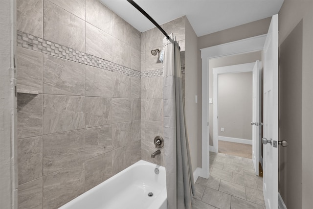 bathroom with tile patterned floors and shower / bathtub combination with curtain