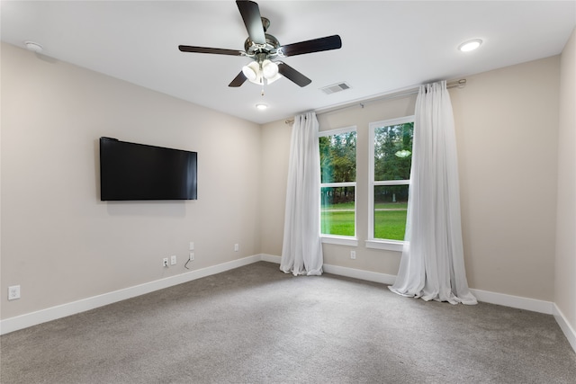 unfurnished room featuring carpet flooring and ceiling fan