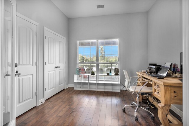 office with dark hardwood / wood-style floors