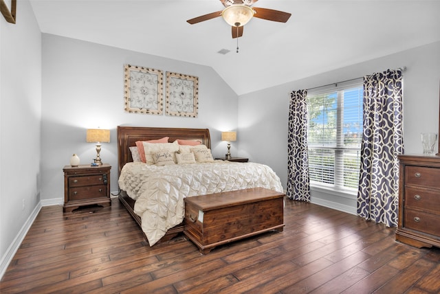 bedroom with ceiling fan, dark hardwood / wood-style flooring, and vaulted ceiling